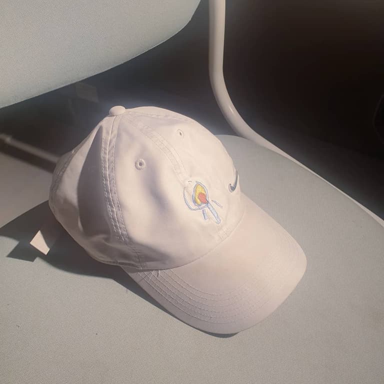 baseball cap with an art of nujabes on it