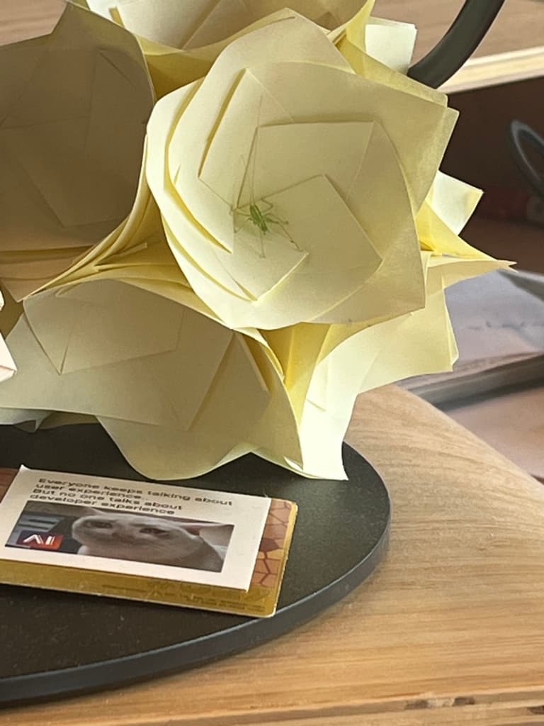 A photo of an insect inside the yellow colored kusudama ball